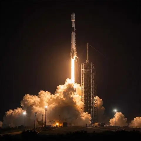 An Auriga-3 rocket lifts off at night from the Cape Sorrel launch complex.