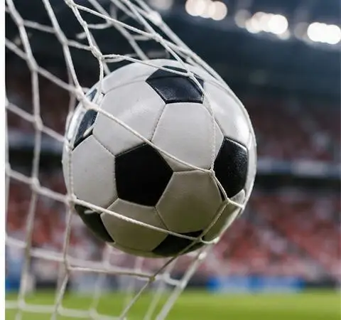 The ball hits the back of the net during a Coravian Premier Division match.